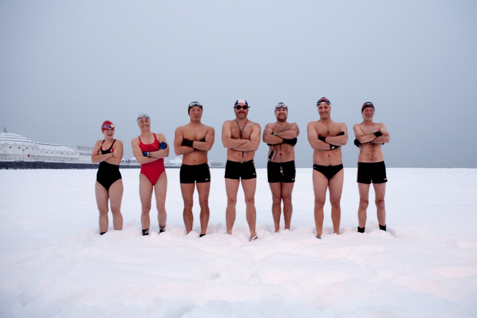 Brighton swimming club members posing in the snow