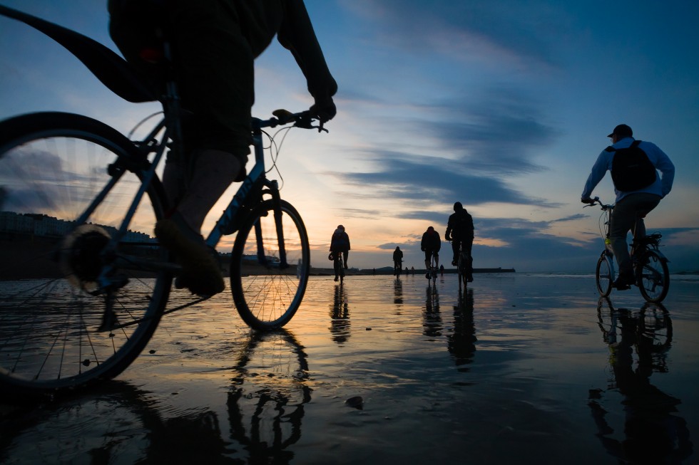Brighton low tide bike ride silhouette