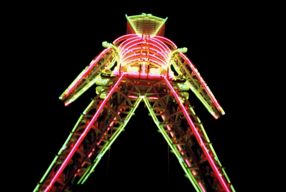 Burning Man 2005 neon man by night by Kevin Meredith