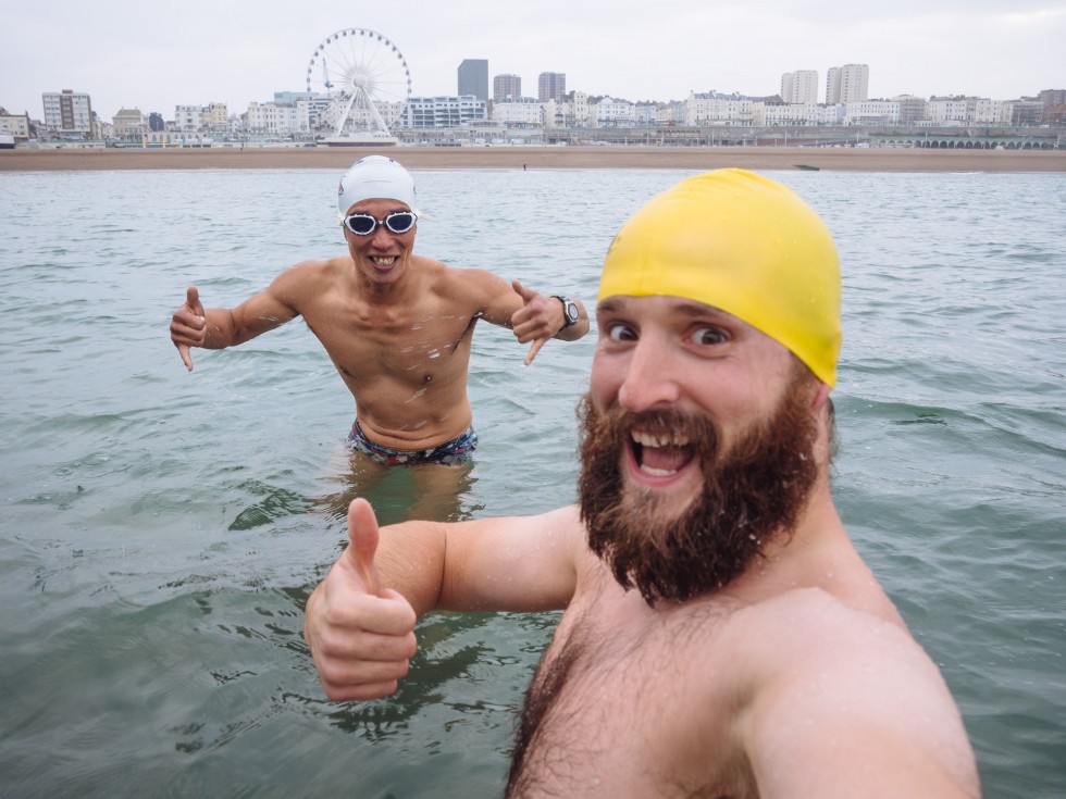 Shoichi and I standing on the sunken barge at the end of Brighton Pier
