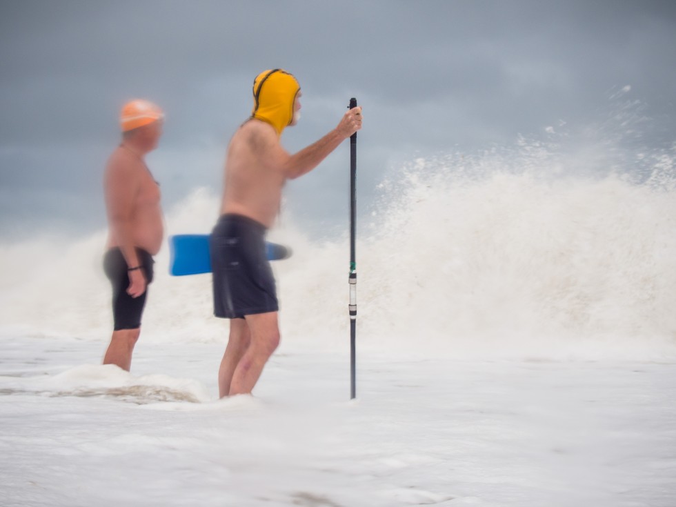 Dave Sawyers serving a rough sea.