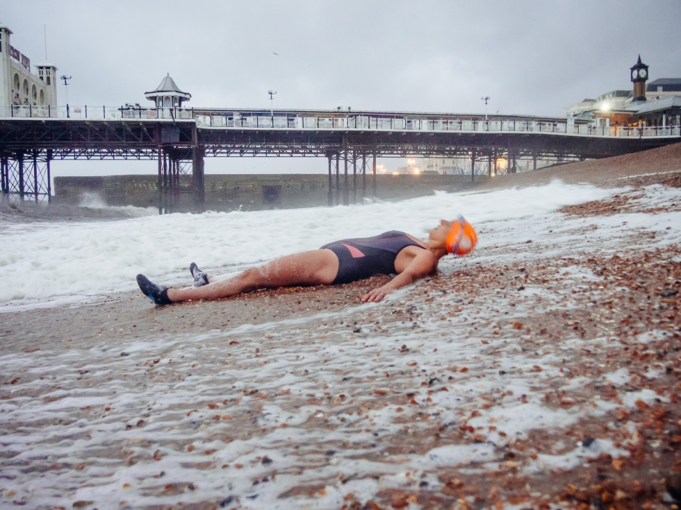Martina letting waves wash over her