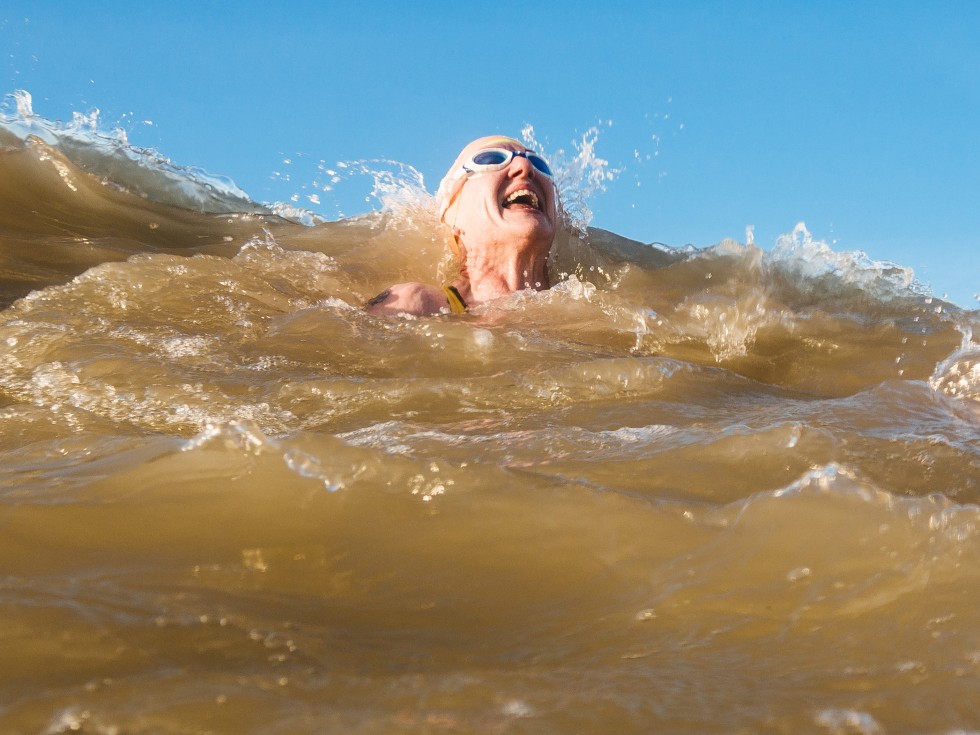 Sarah on the crest of a wave